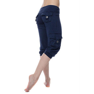 Cropped pants with elastic waist-button pockets.