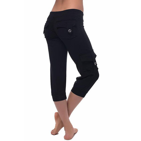 Cropped pants with elastic waist-button pockets.