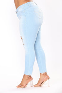 Elastic embroidered denim jeans.